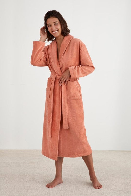 Salmon-colored Freya robe with shawl collar, pockets, and waist tie, made from 100% OEKO-TEX® Certified cotton.