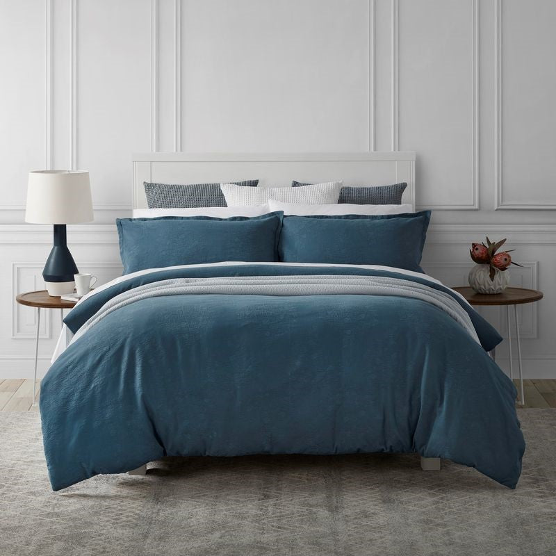 BALSAM Duvet Cover Set featuring fir-like design on mid-blue, made from OEKO-TEX® cotton for California King beds.