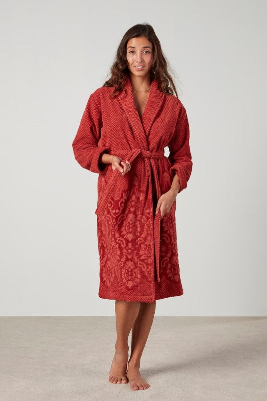 Comfortable clay-colored jacquard floral robe with shawl collar, pockets, and tie, made from OEKO-TEX® cotton.
