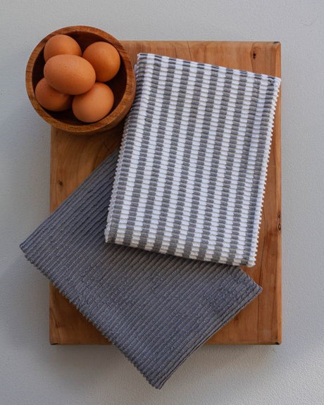 Ribbed granite tea towels from BAKSANA, crafted from OEKO-TEX® cotton for maximum absorbency and style.