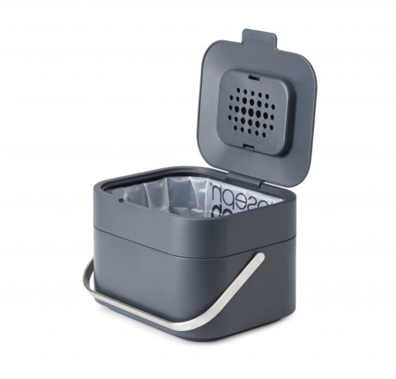 Joseph Joseph Stack 4 in graphite, a stylish food waste caddy with ventilated design and odour filter for fresh kitchen disposal.