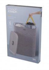 Joseph Joseph Tota 90-litre laundry basket in grey with dual compartments for easy lights and darks separation.