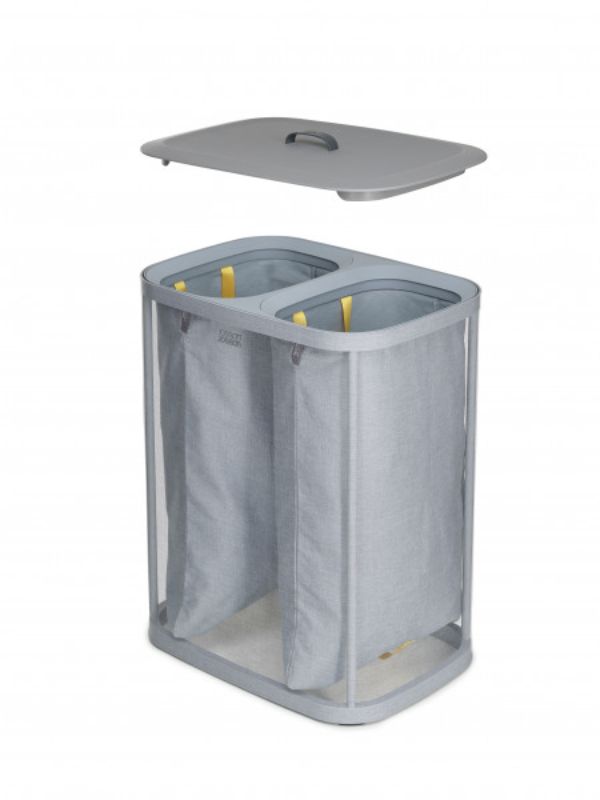 Joseph Joseph Tota 90-litre laundry basket in grey with two removable compartments for efficient separation of lights and darks.