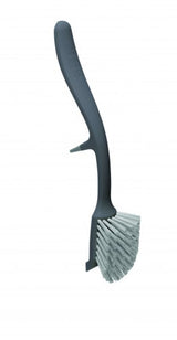 Joseph Joseph Edge Dish Brush in Grey with curved non-scratch head and integrated pan scraper for effective cleaning.
